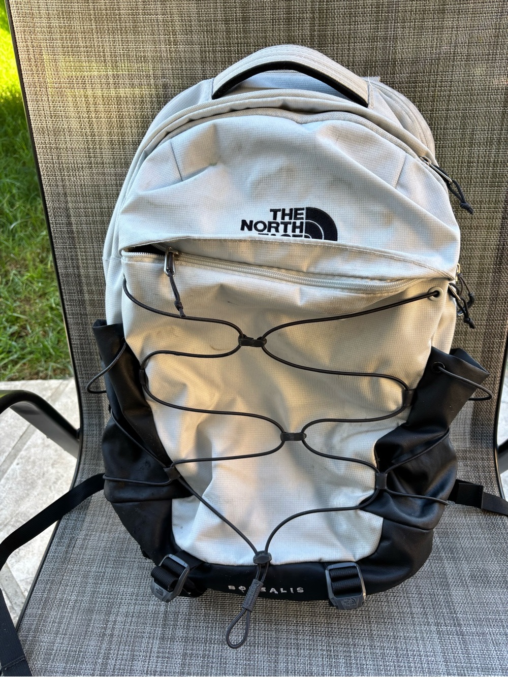 The North Face Menβs Backpack in White and Black with Front Bungee